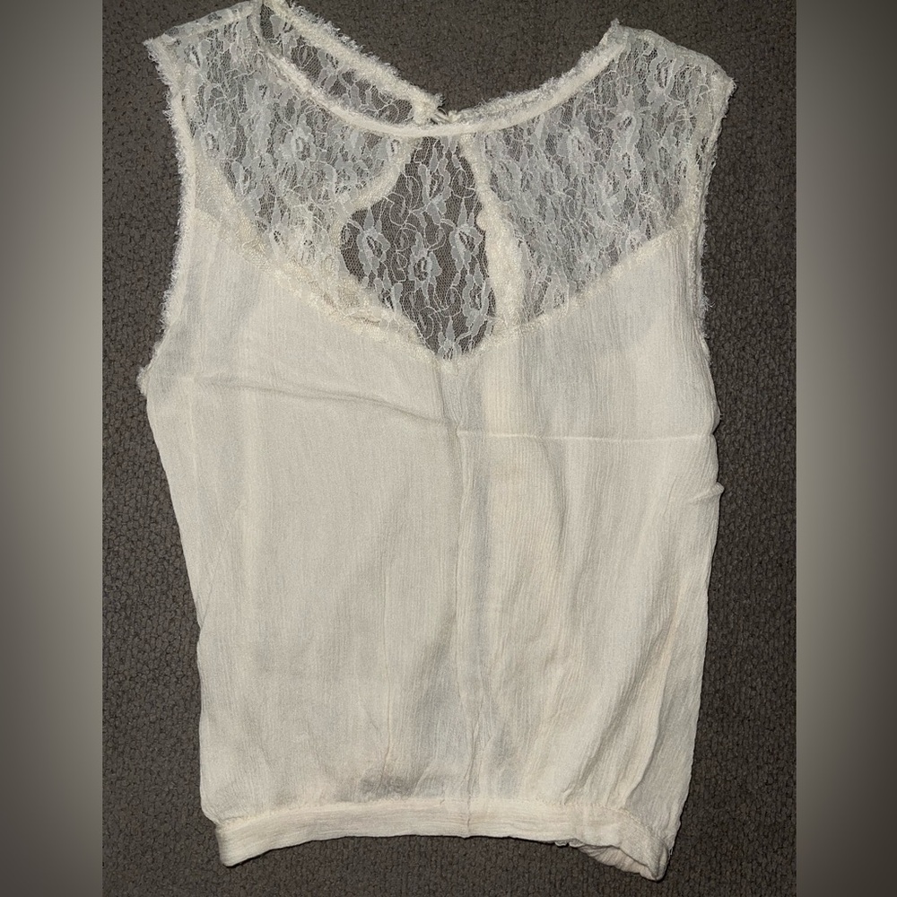 Buckle shirt size medium lace at top backless ties in back at waist.